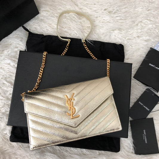 Saint Laurent Cassandre Matelassé Wallet on Chain in Gold Quilted Leather