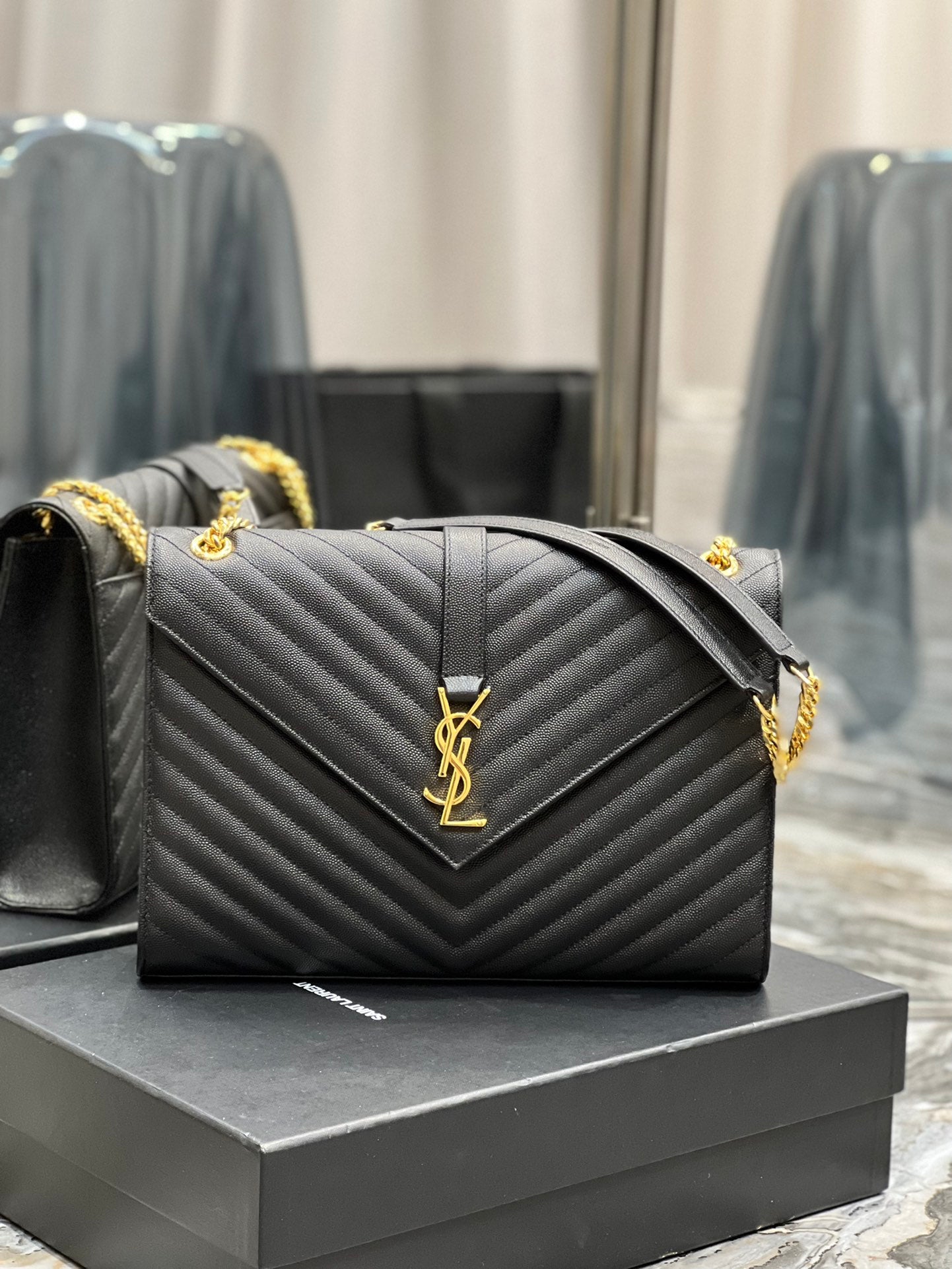 Saint Laurent Monogram Medium Envelope Bag in Black Quilted Leather with Gold Hardware