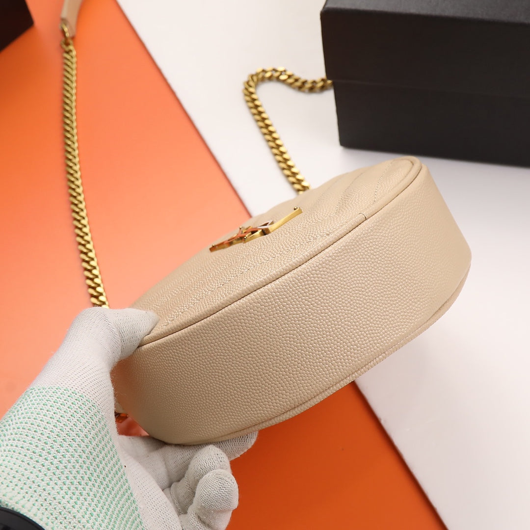Yves Saint Laurent Vinyle Round Camera Bag in Matelassé Grain de Poudre Leather - Beige