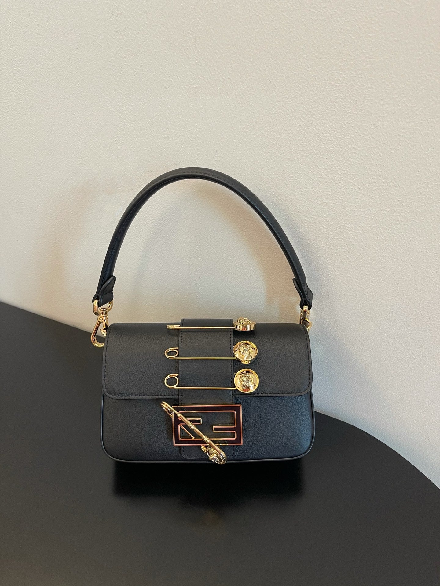 Fendi Black Leather Baguette Bag with Gold Safety Pin Embellishments