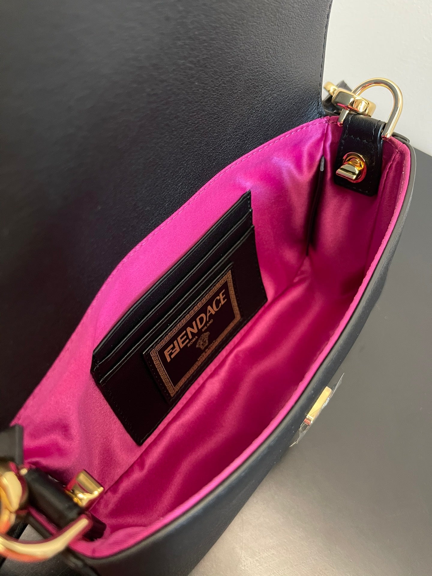 Fendi Black Leather Baguette Bag with Gold Safety Pin Embellishments