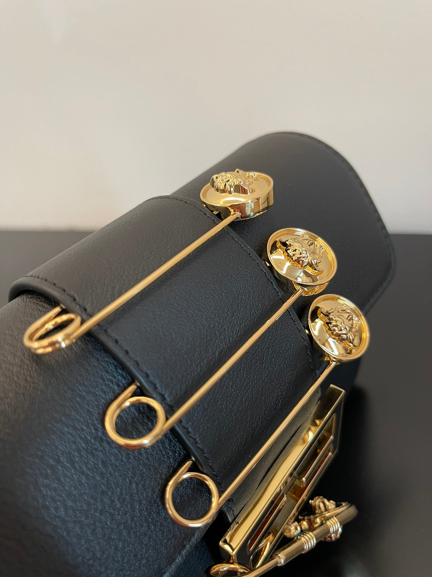 Fendi Black Leather Baguette Bag with Gold Safety Pin Embellishments