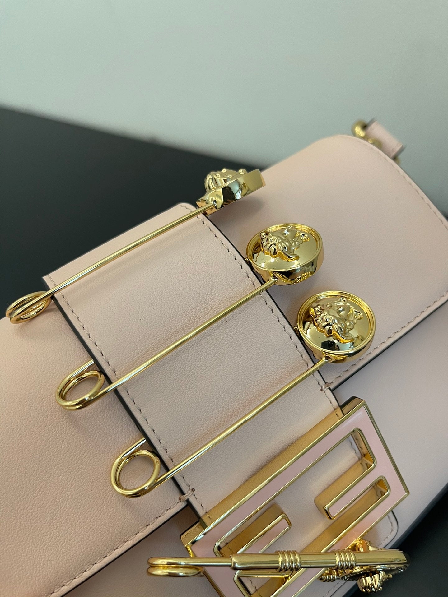Fendi Mini Baguette Pink Leather Handbag with Gold Safety Pin Accents