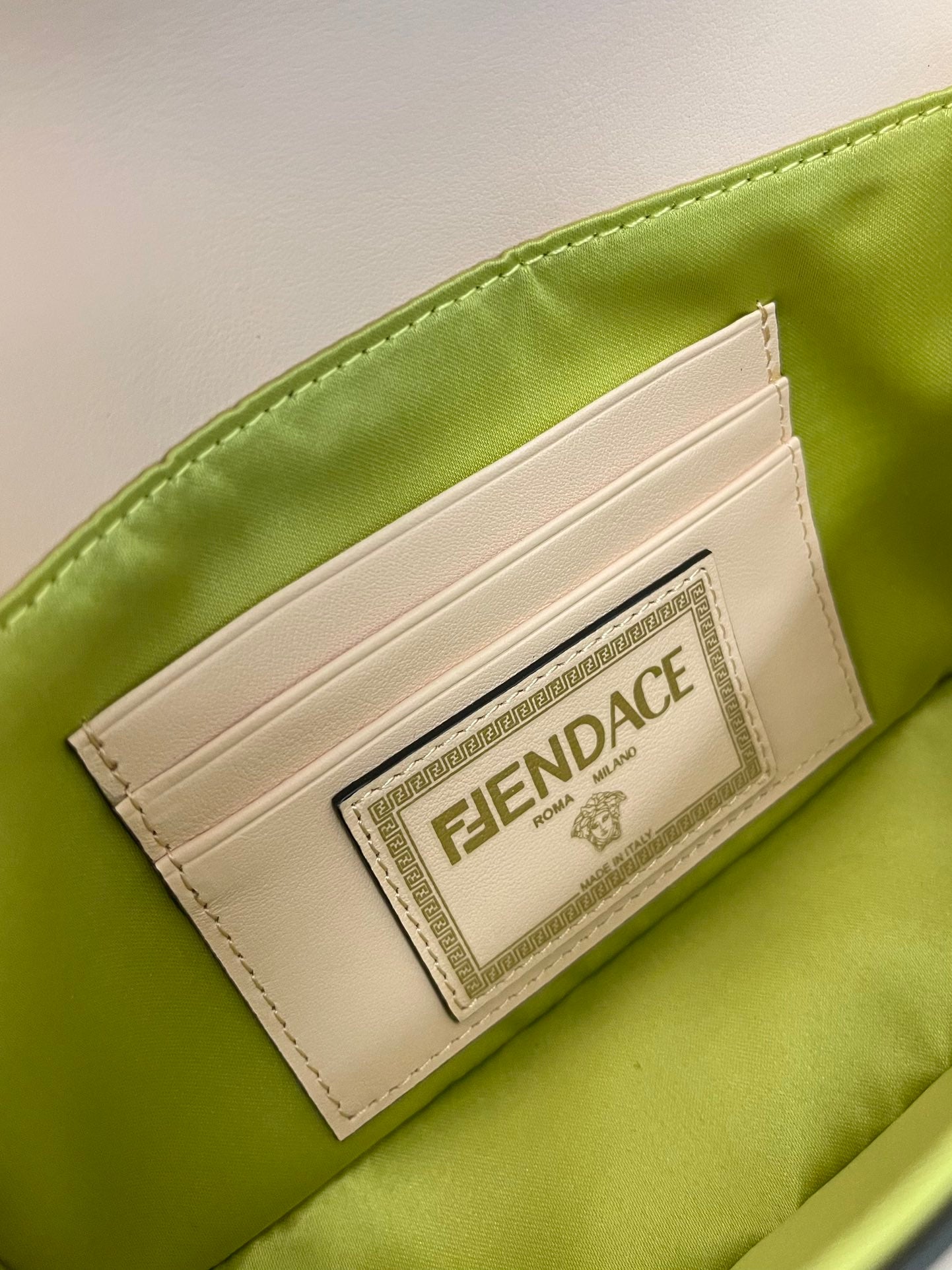 Fendi Mini Baguette Pink Leather Handbag with Gold Safety Pin Accents