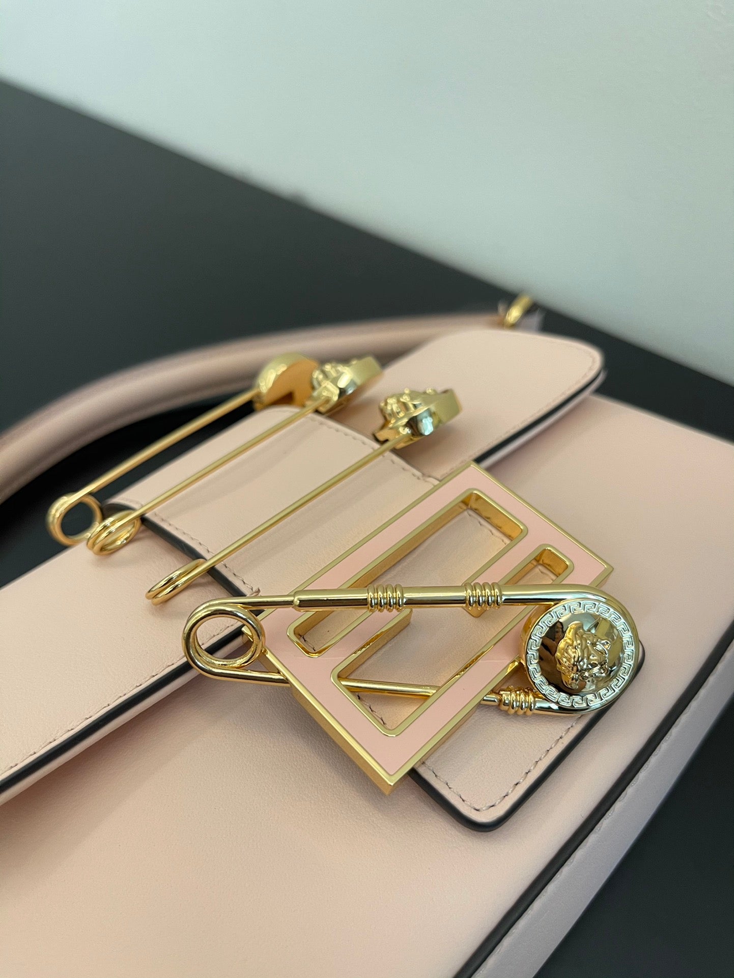 Fendi Mini Baguette Pink Leather Handbag with Gold Safety Pin Accents