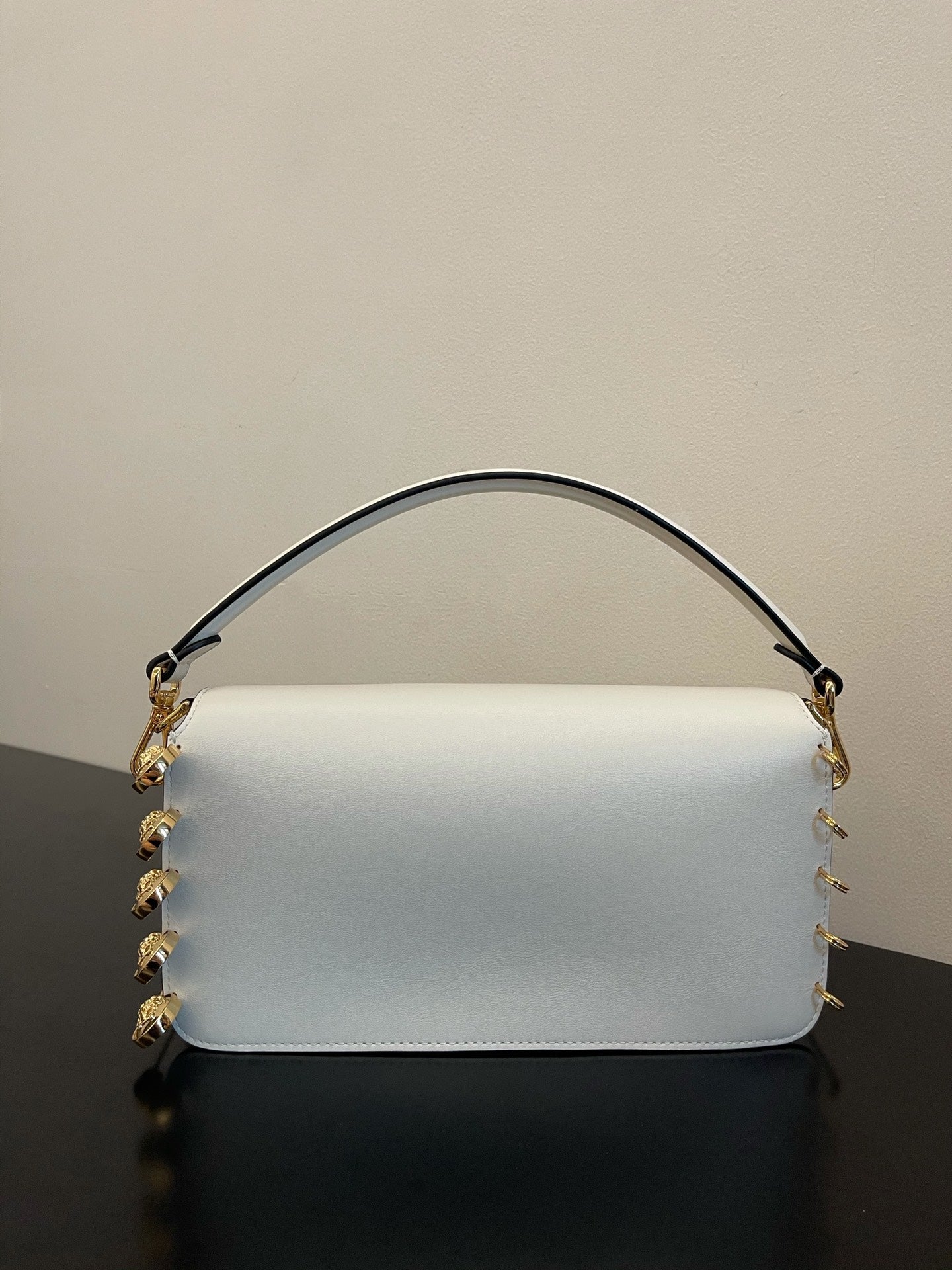 Fendi White Leather Baguette Bag with Gold-Tone Hardware and Detachable Strap