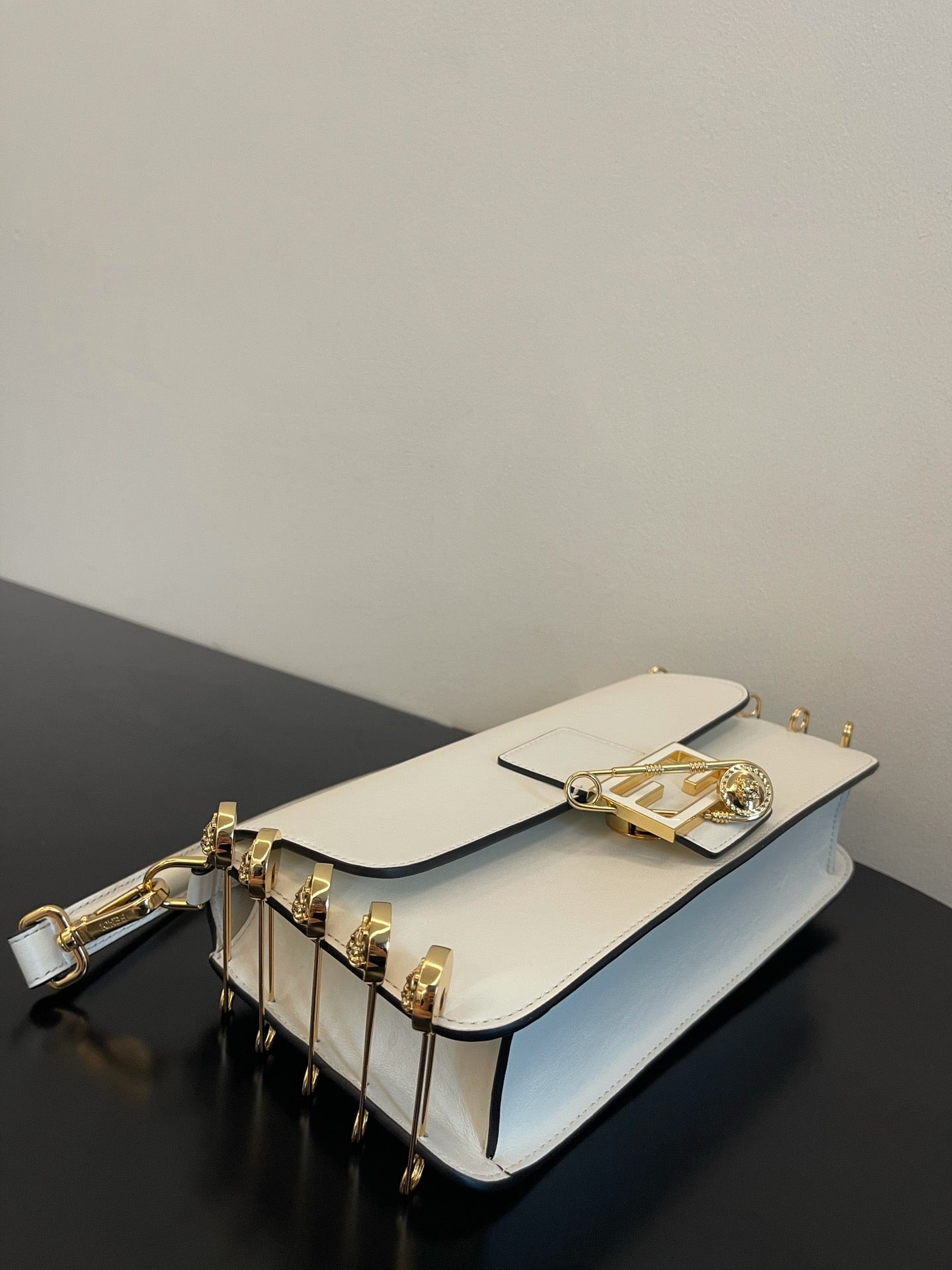 Fendi White Leather Baguette Bag with Gold-Tone Hardware and Detachable Strap