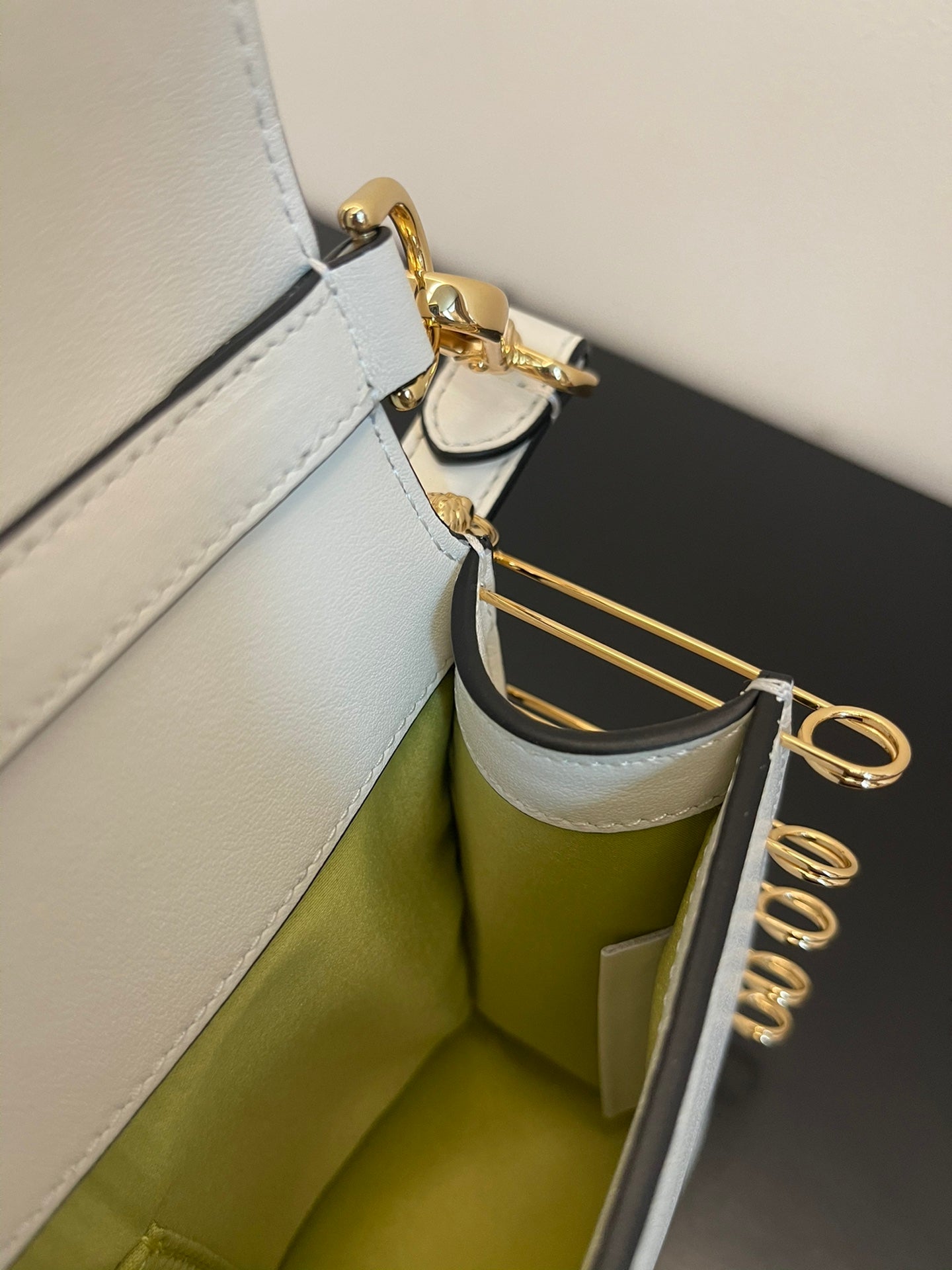 Fendi White Leather Baguette Bag with Gold-Tone Hardware and Detachable Strap
