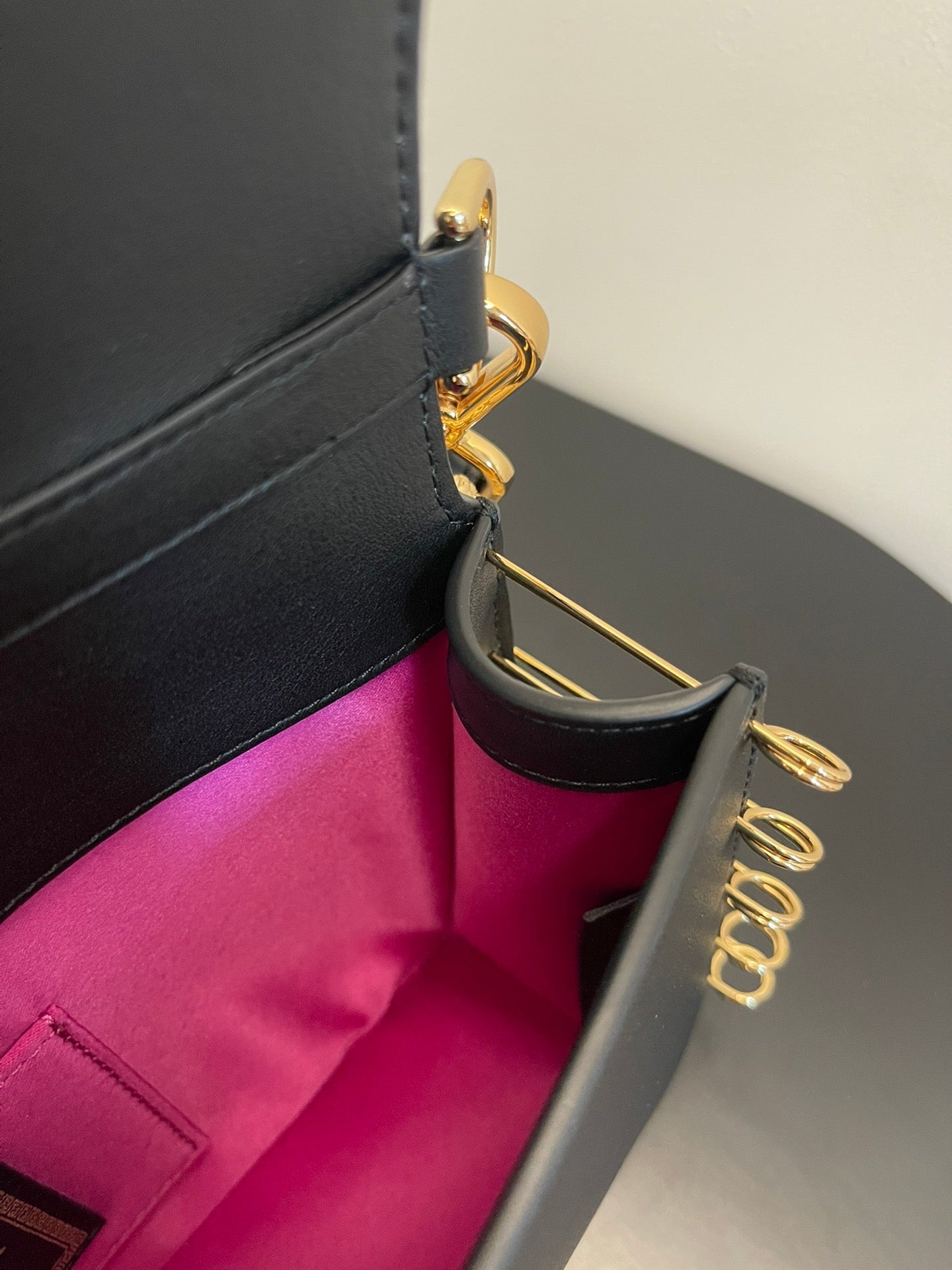 Black Leather Shoulder Bag with Gold Safety Pin Detail &amp; Studded Accents