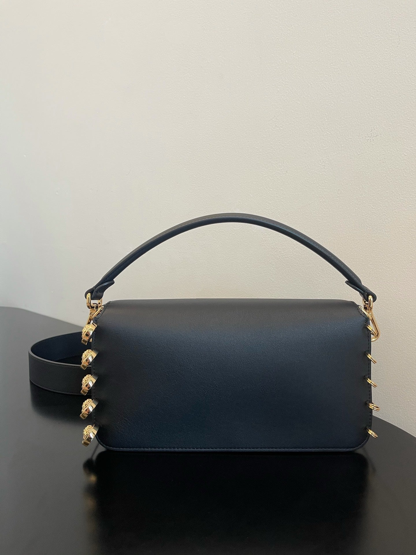 Black Leather Shoulder Bag with Gold Safety Pin Detail &amp; Studded Accents