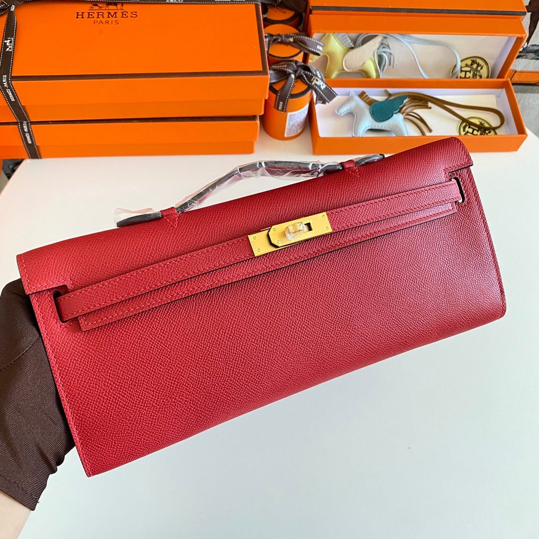 Hermès Kelly Cut Clutch Bag in Red Leather and Beige Fabric with Gold Hardware