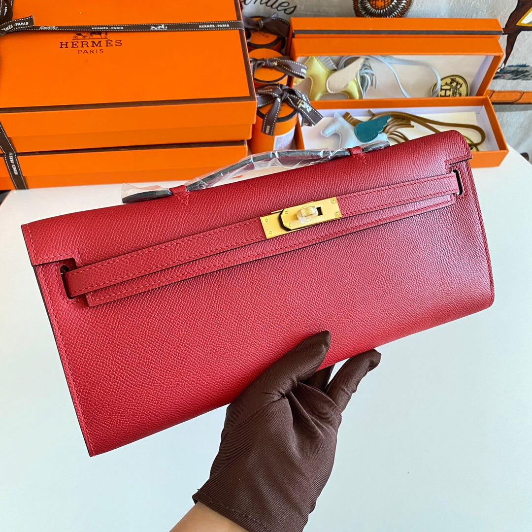 Hermès Kelly Cut Clutch Bag in Red Leather and Beige Fabric with Gold Hardware