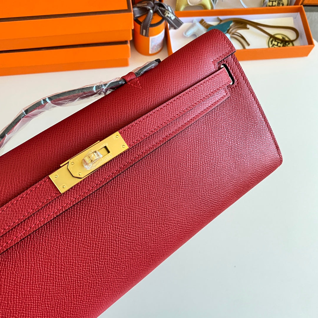 Hermès Kelly Cut Clutch Bag in Red Leather and Beige Fabric with Gold Hardware