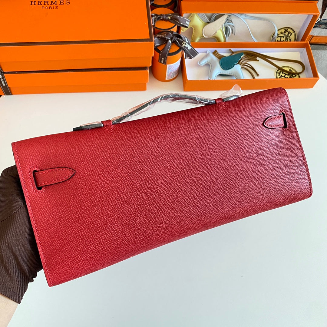 Hermès Kelly Cut Clutch Bag in Red Leather and Beige Fabric with Gold Hardware