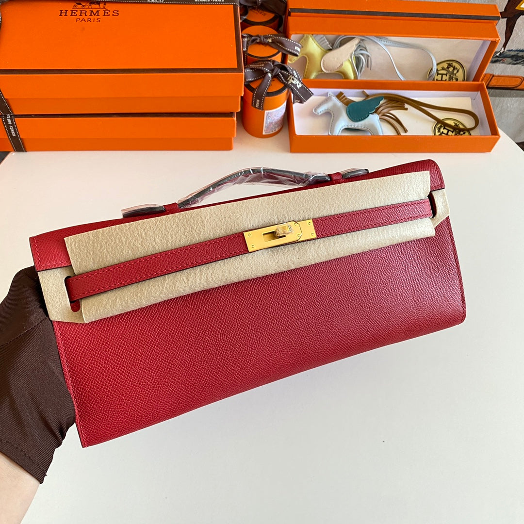 Hermès Kelly Cut Clutch Bag in Red Leather and Beige Fabric with Gold Hardware
