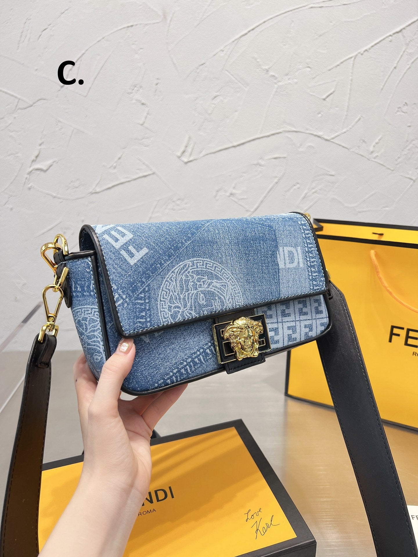 Fendace Baguette Denim Shoulder Bag with Medusa Clasp and FF Logo