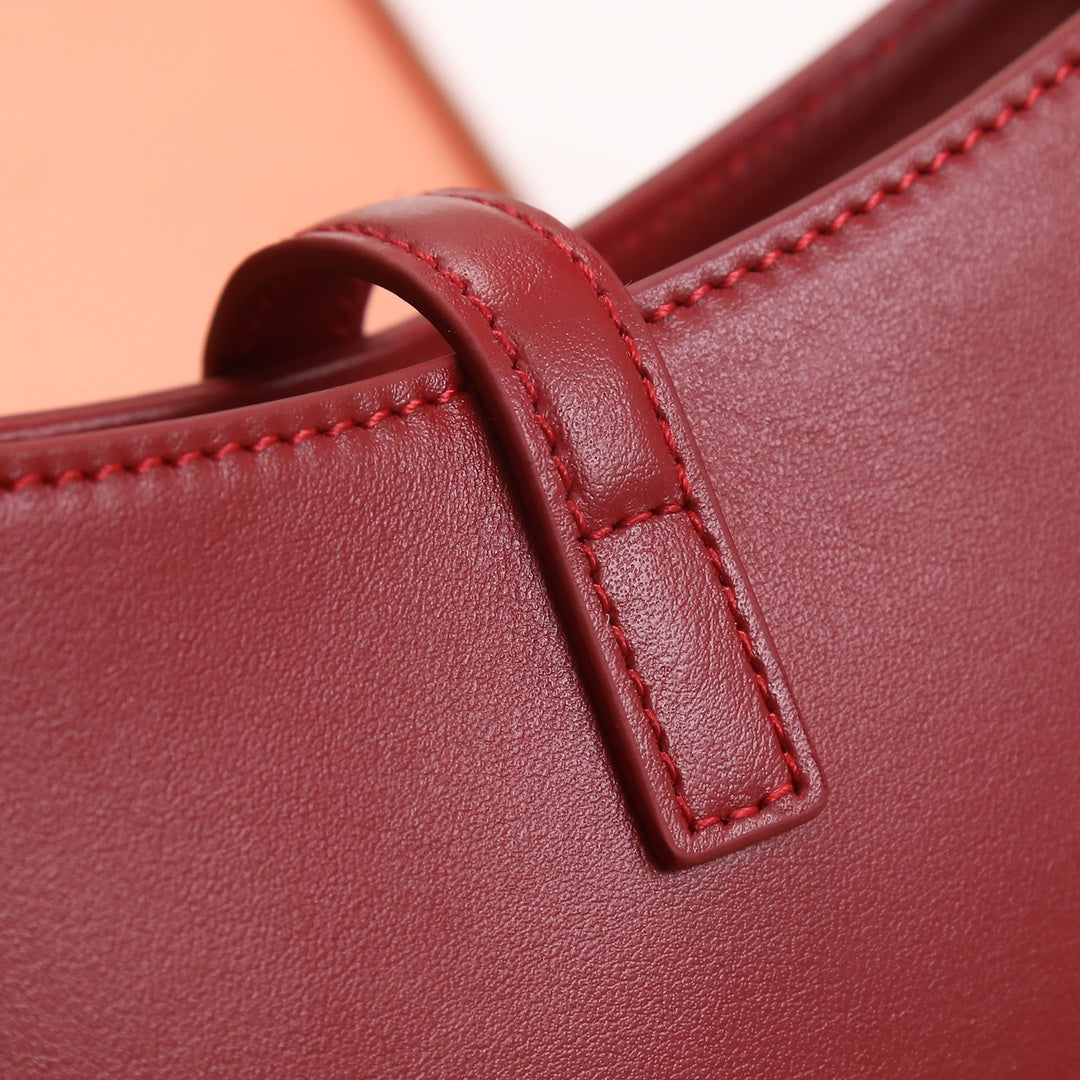 Red Textured Leather Accessory Detail - Stitched Mounting Loop