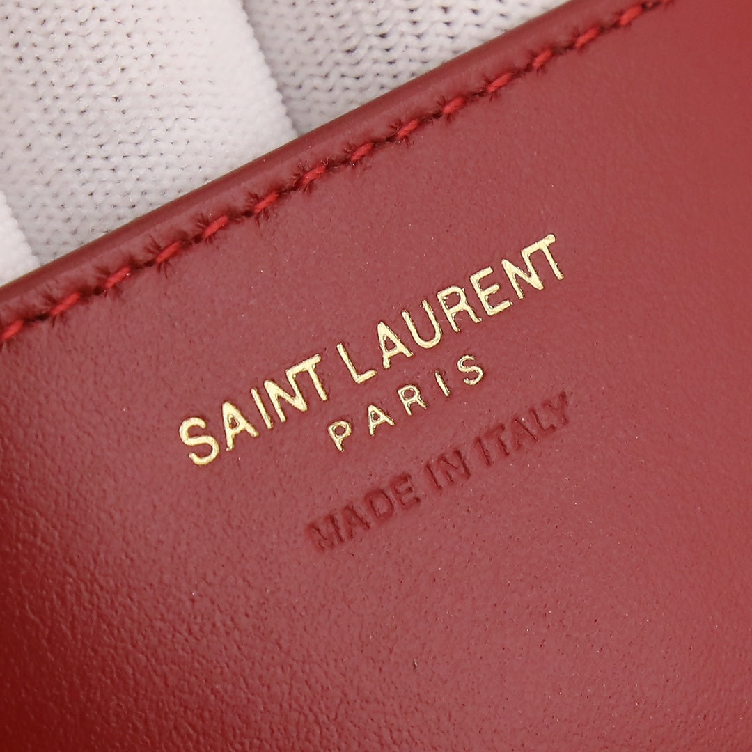 Red Textured Leather Accessory Detail - Stitched Mounting Loop