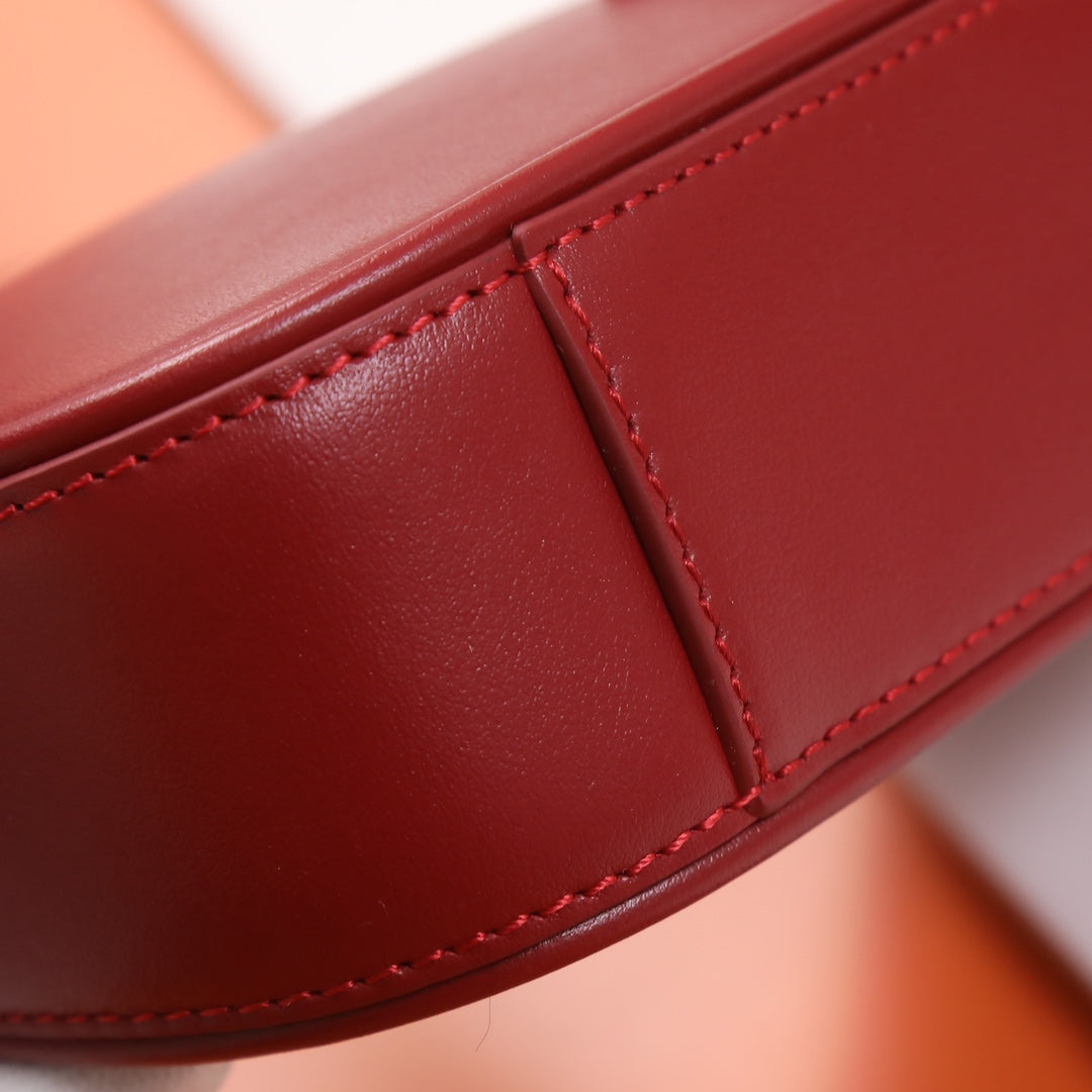 Red Textured Leather Accessory Detail - Stitched Mounting Loop
