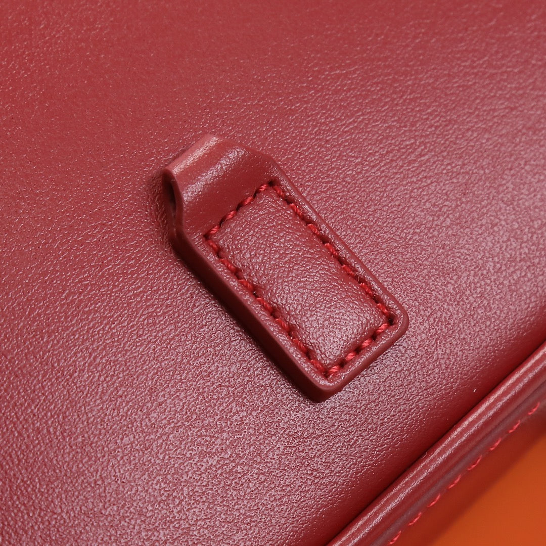 Red Textured Leather Accessory Detail - Stitched Mounting Loop