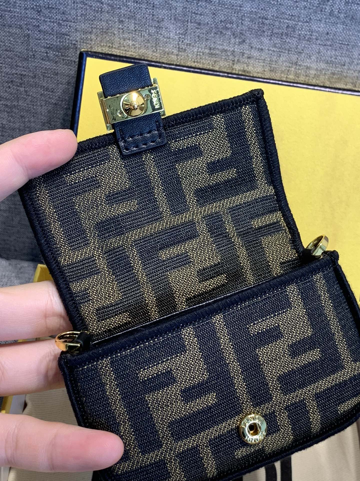 Fendi FF Monogram Mini Baguette Bag with Gold Chain Strap