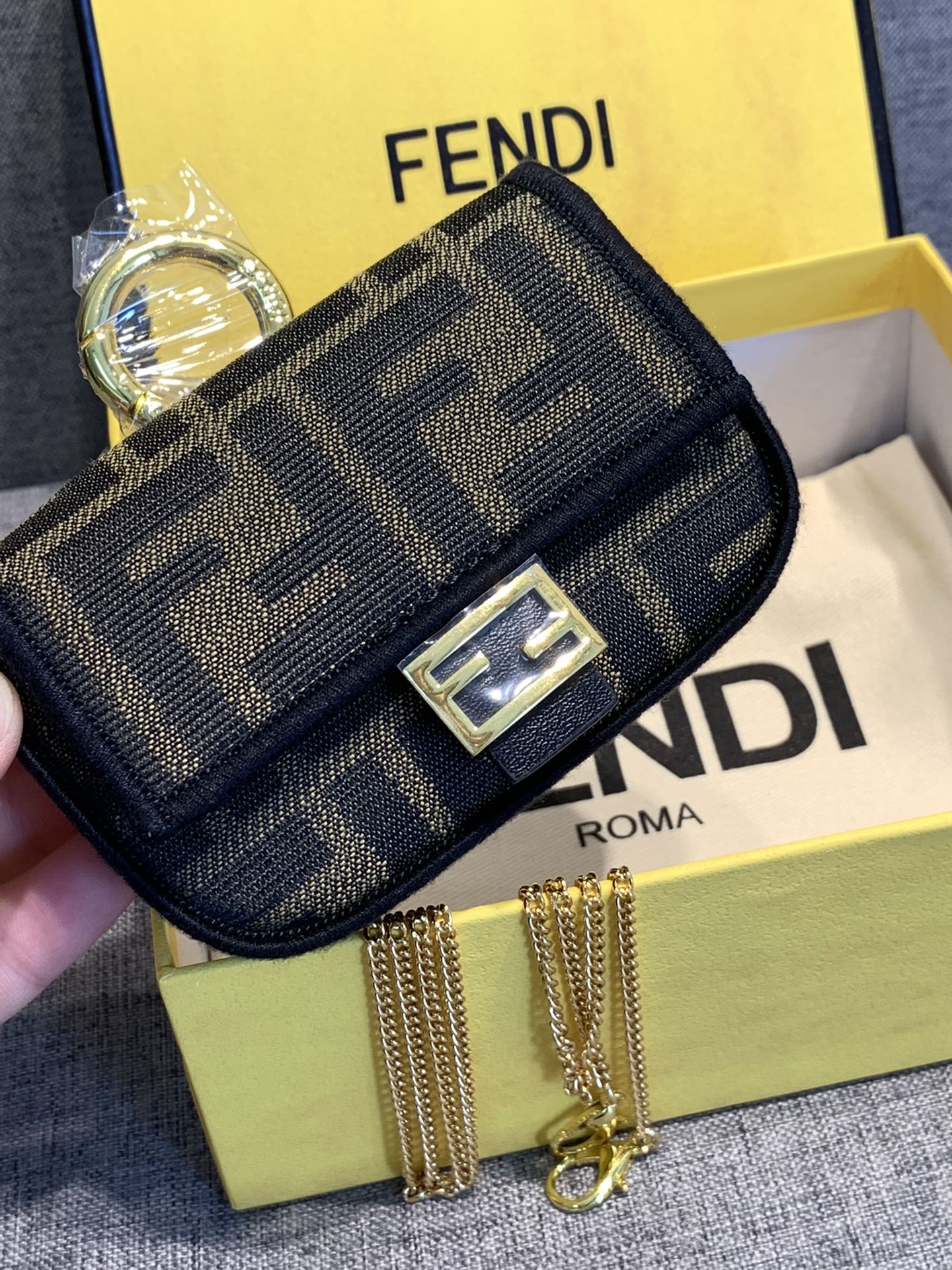 Fendi FF Monogram Mini Baguette Bag with Gold Chain Strap