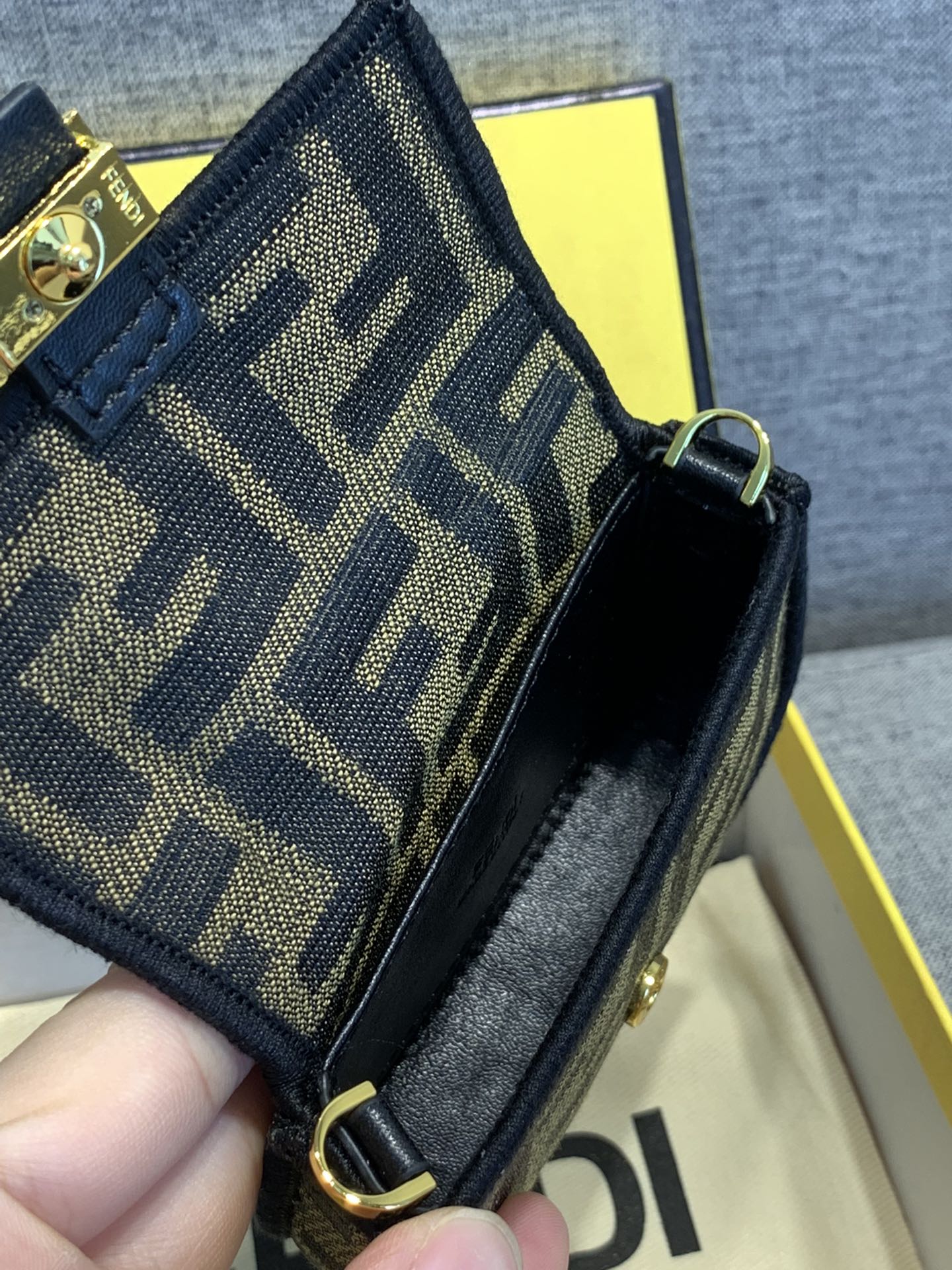 Fendi FF Monogram Mini Baguette Bag with Gold Chain Strap