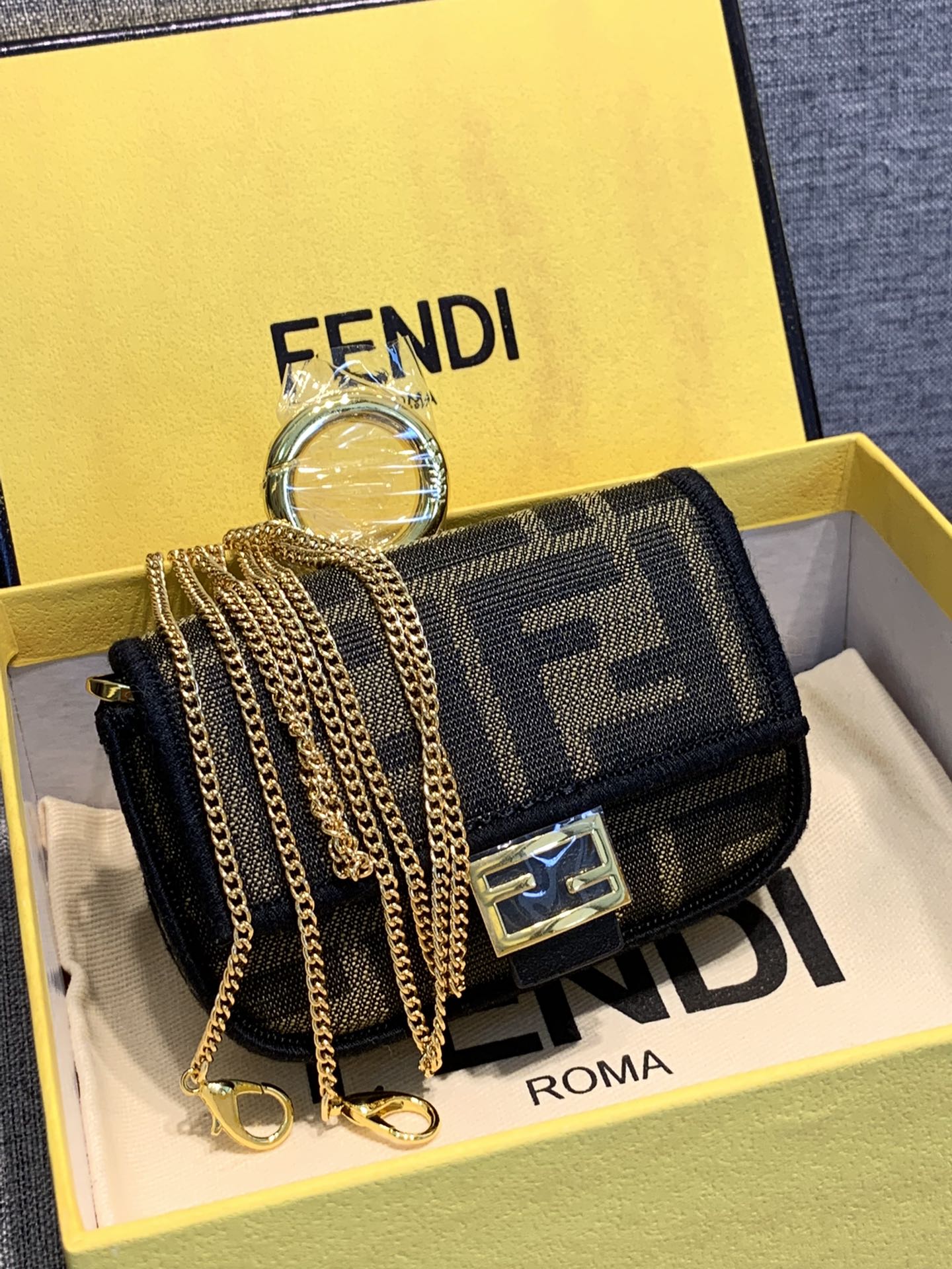 Fendi FF Monogram Mini Baguette Bag with Gold Chain Strap