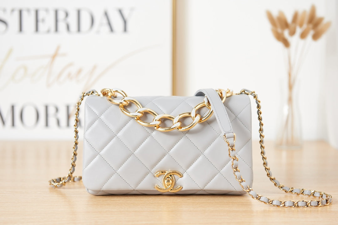 Light Blue Quilted Shoulder Bag with Gold Chain Strap and Chunky Link Hardware