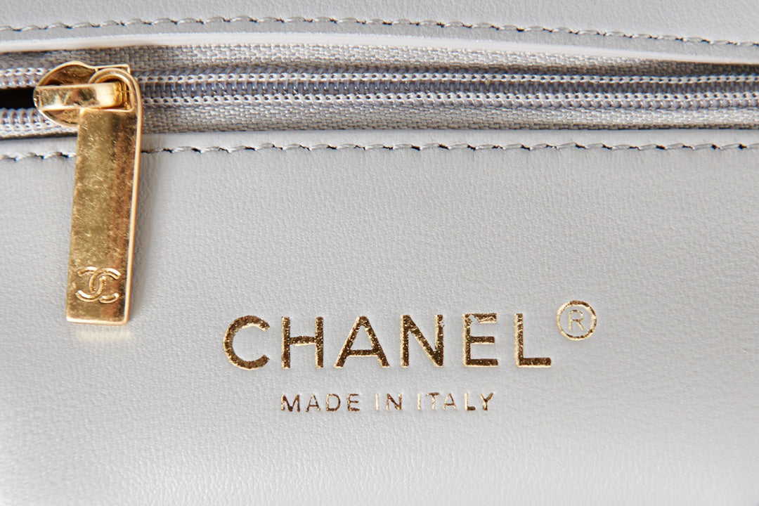 Light Blue Quilted Shoulder Bag with Gold Chain Strap and Chunky Link Hardware