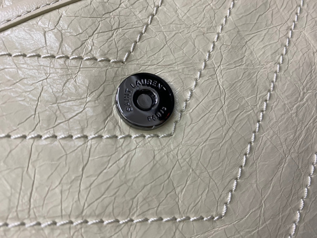 Saint Laurent Niki Medium Shoulder Bag in Quilted Vintage Leather - Off-White