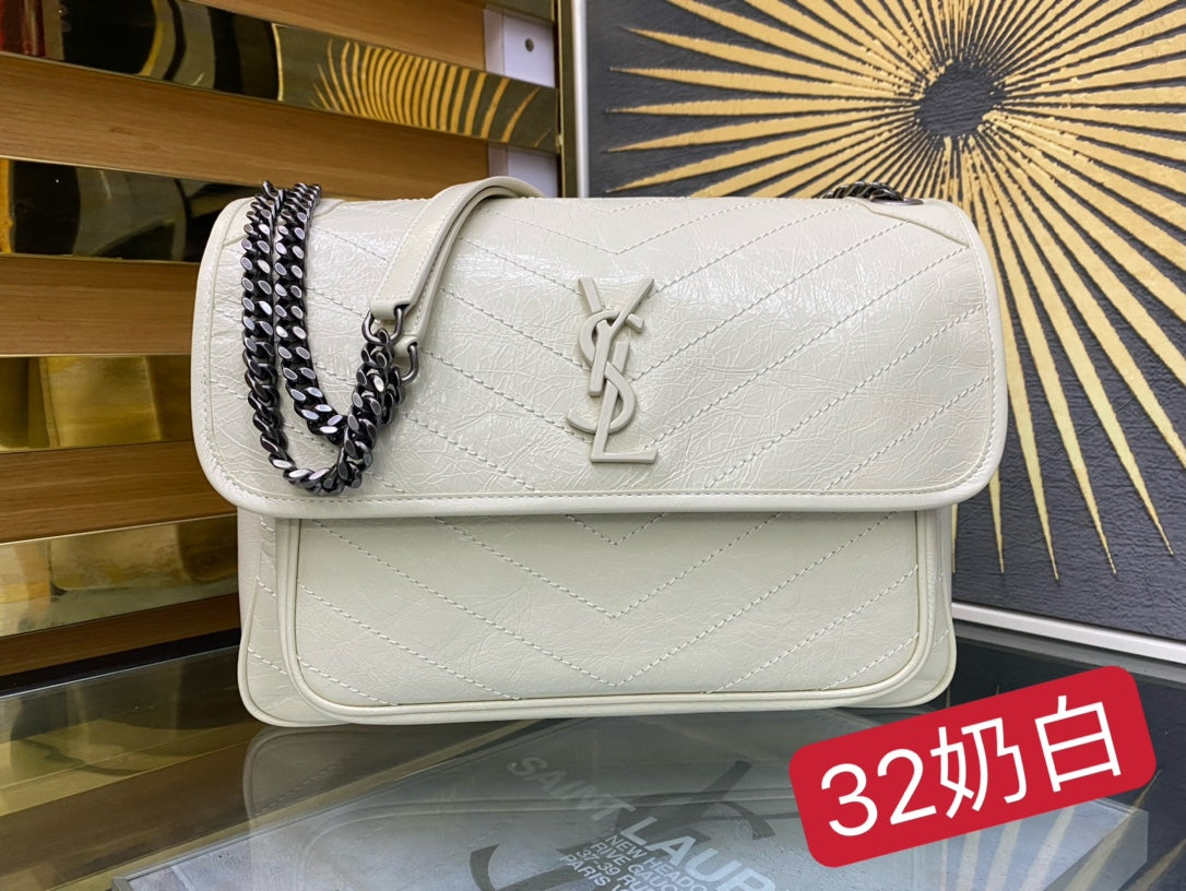 Saint Laurent Niki Medium Shoulder Bag in Quilted Vintage Leather - Off-White