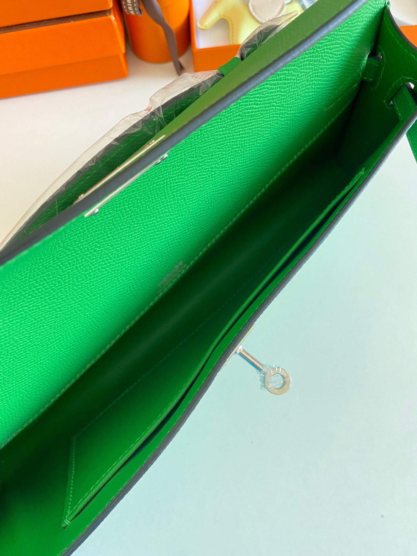 Hermès Kelly Cut Clutch Bag in Vibrant Green Leather with Silver Hardware