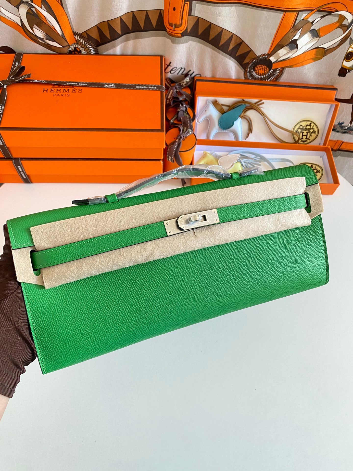 Hermès Kelly Cut Clutch Bag in Vibrant Green Leather with Silver Hardware
