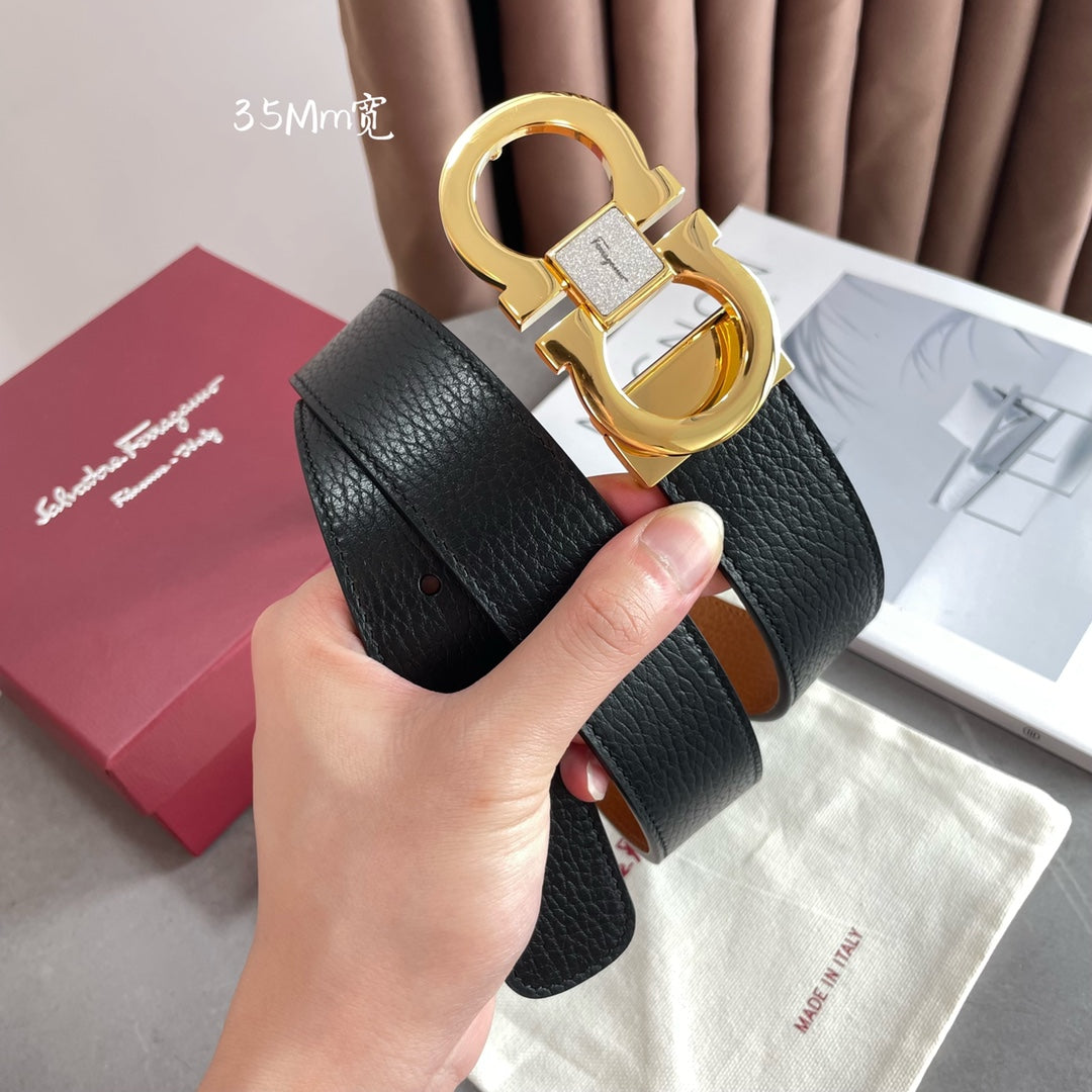 Salvatore Ferragamo Gancini Reversible Belt in Black Pebbled Leather with Gold-Tone Buckle, 35mm
