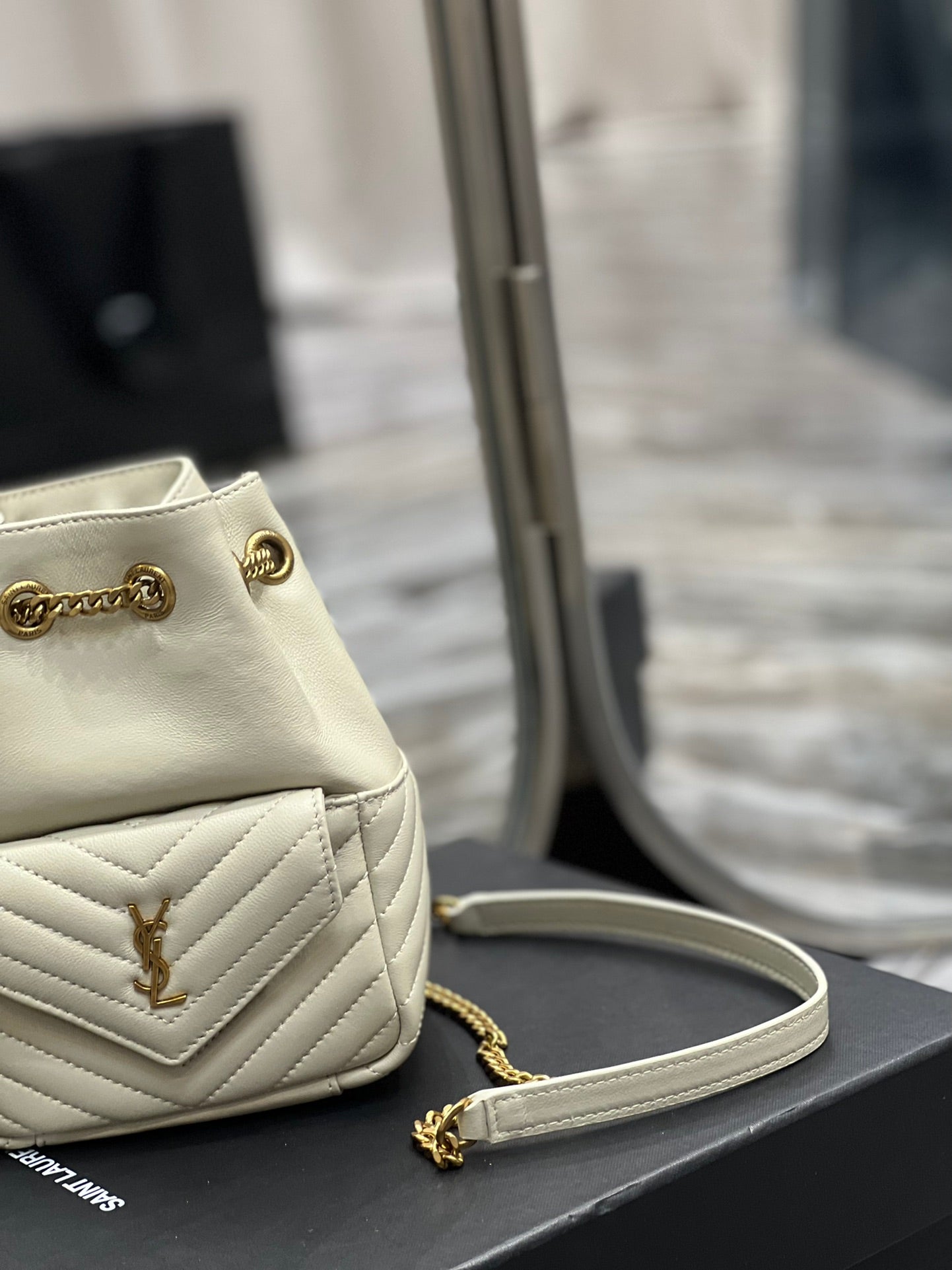 Saint Laurent Joe Mini Bucket Backpack in Quilted Leather - Beige