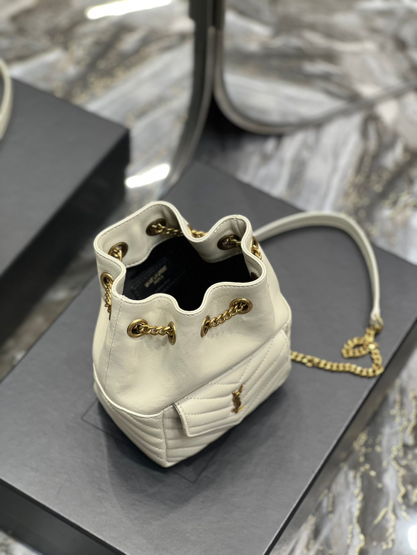 Saint Laurent Joe Mini Bucket Backpack in Quilted Leather - Beige