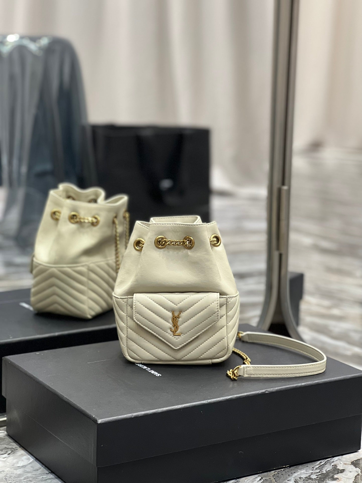 Saint Laurent Joe Mini Bucket Backpack in Quilted Leather - Beige