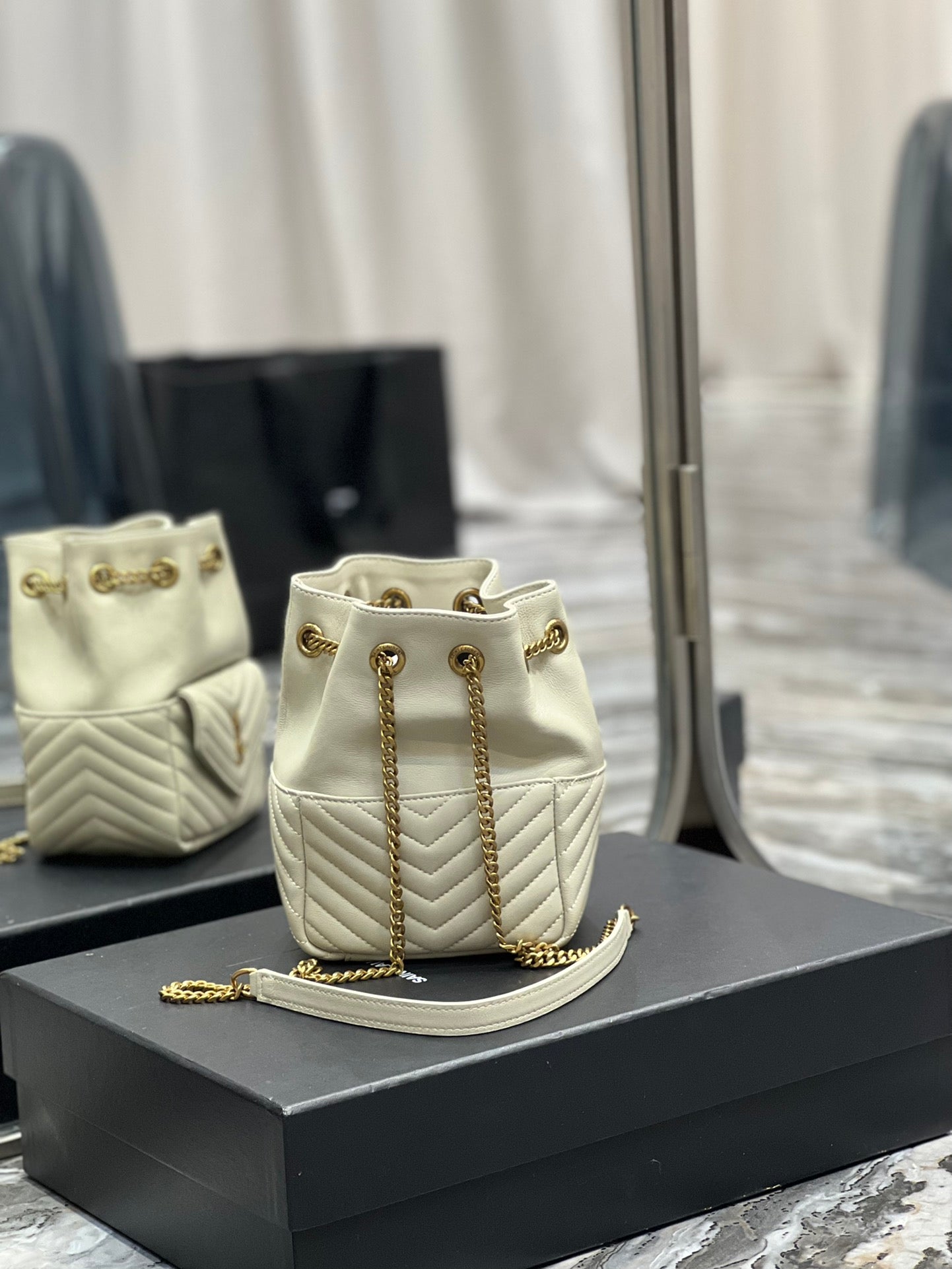 Saint Laurent Joe Mini Bucket Backpack in Quilted Leather - Beige