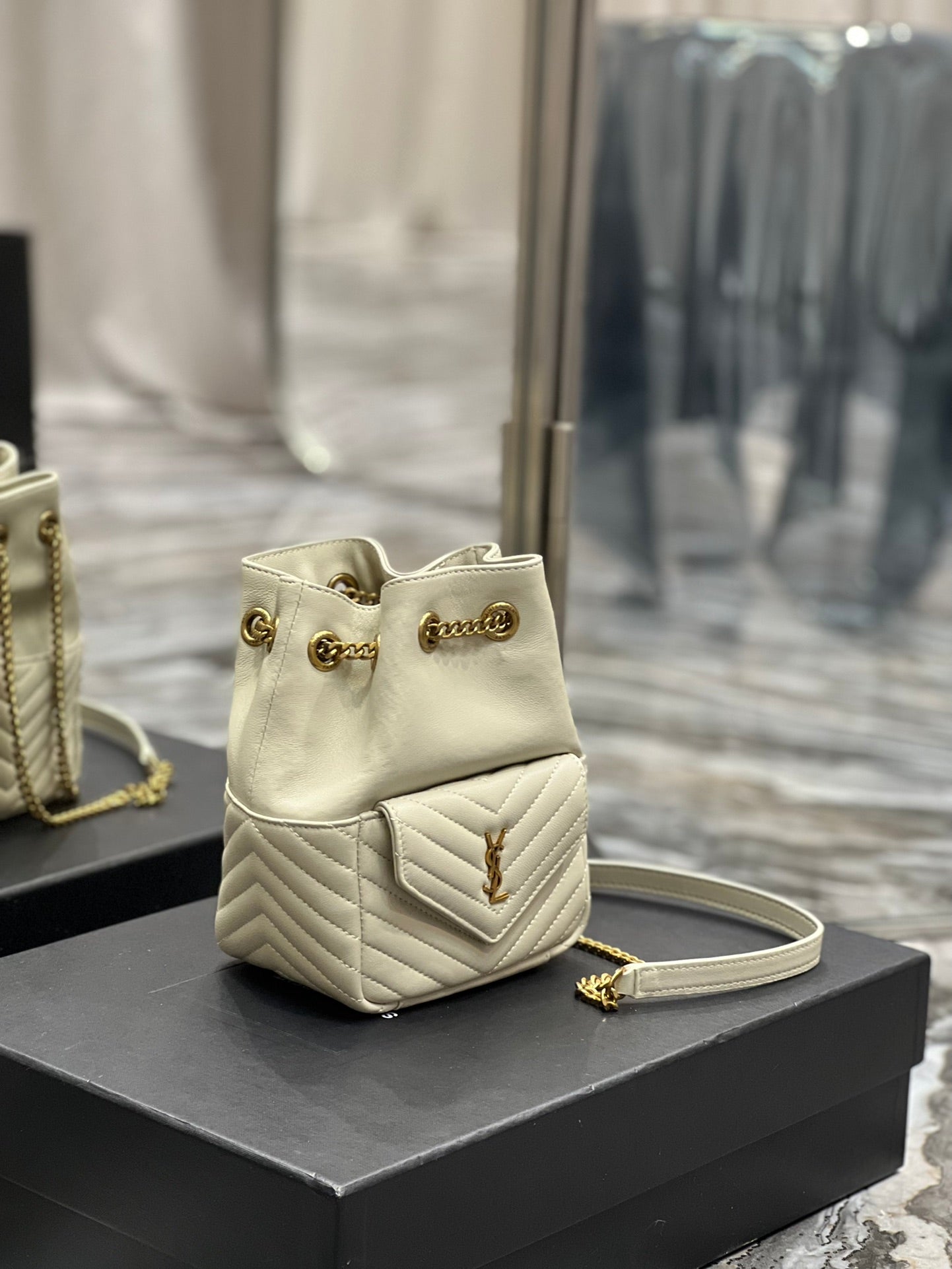 Saint Laurent Joe Mini Bucket Backpack in Quilted Leather - Beige