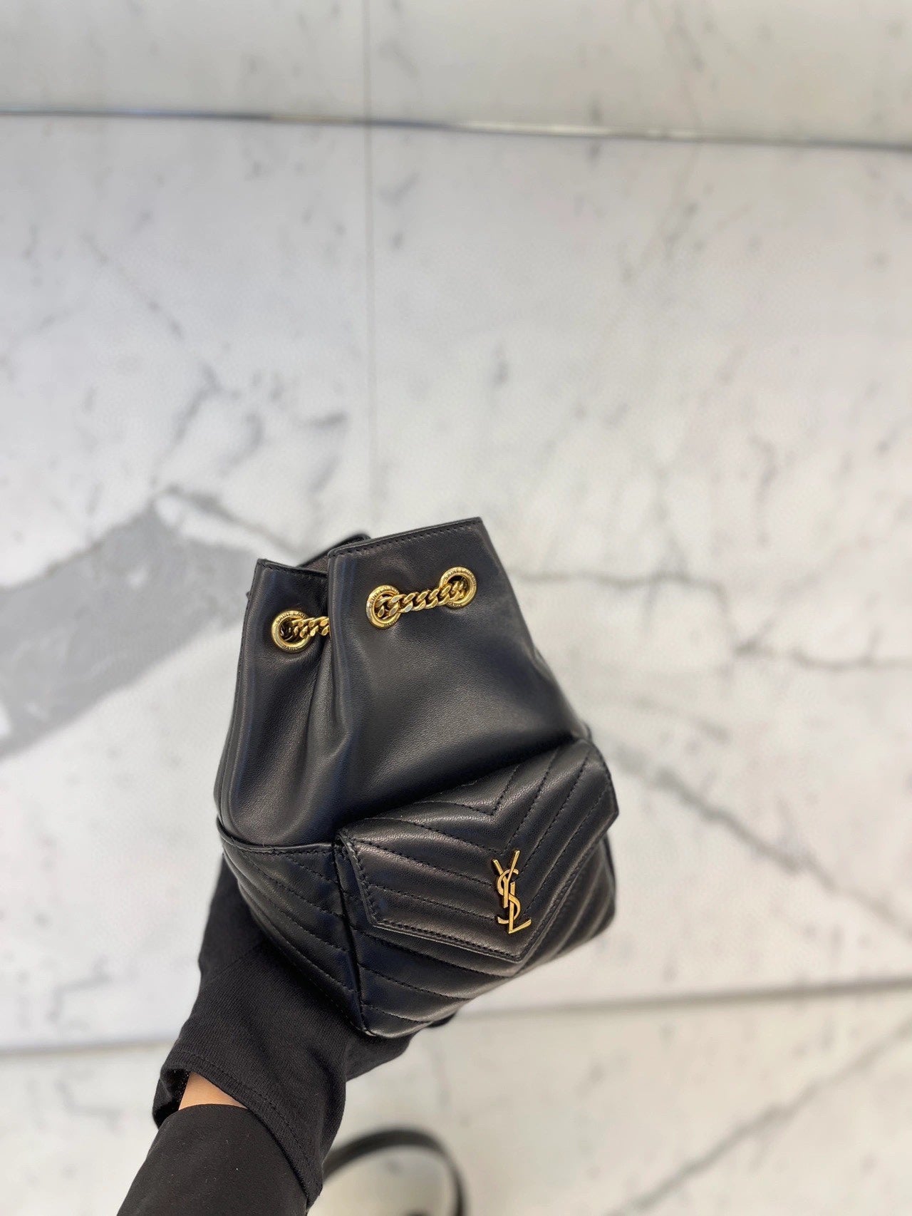 Saint Laurent Black Leather Quilted Bucket Bag and White Leather Loafers Set