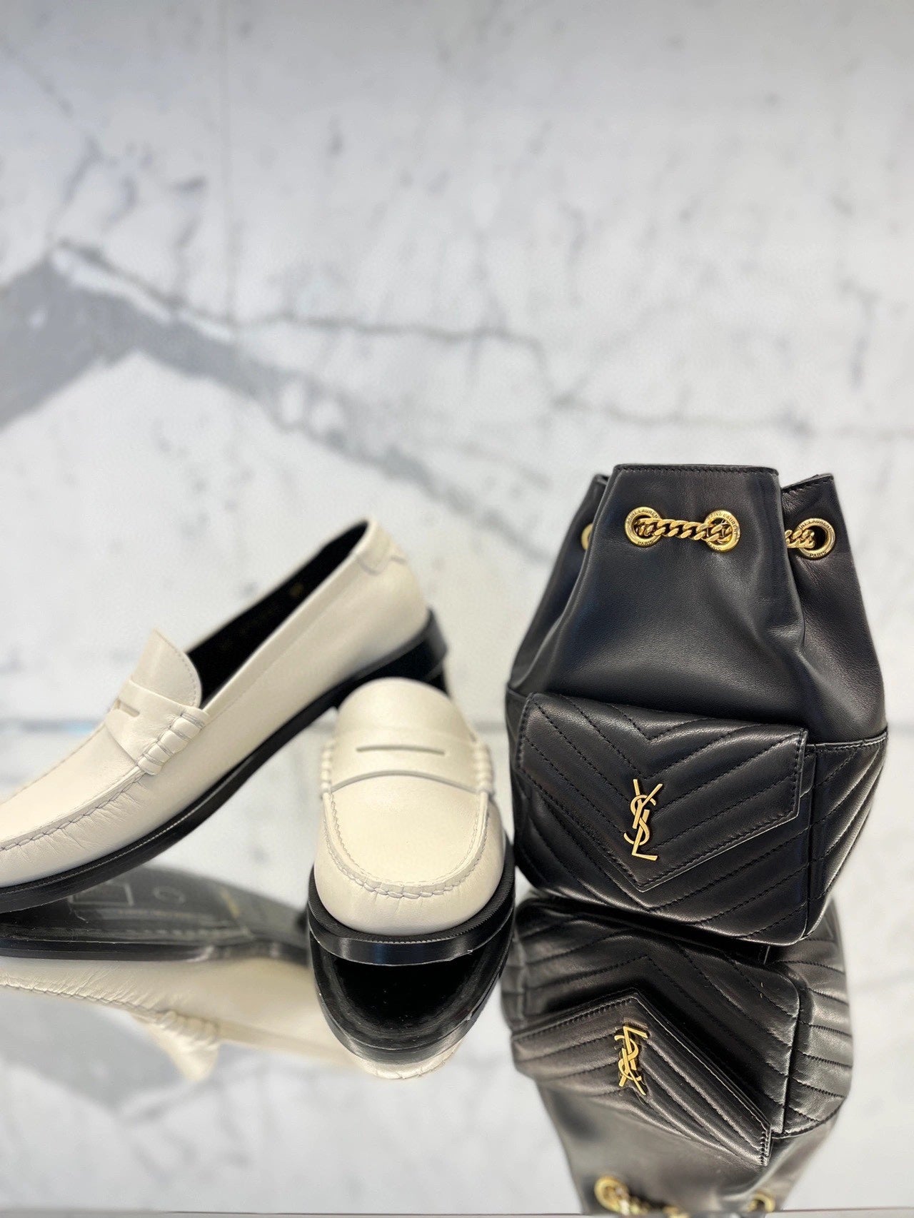 Saint Laurent Black Leather Quilted Bucket Bag and White Leather Loafers Set
