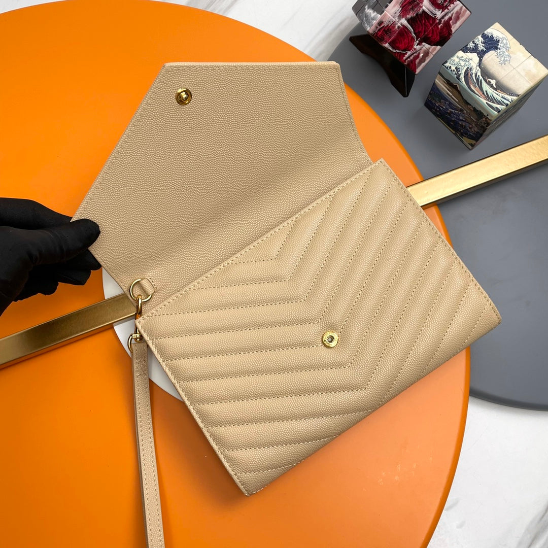 Saint Laurent Monogram Quilted Leather Clutch with Wristlet - Beige