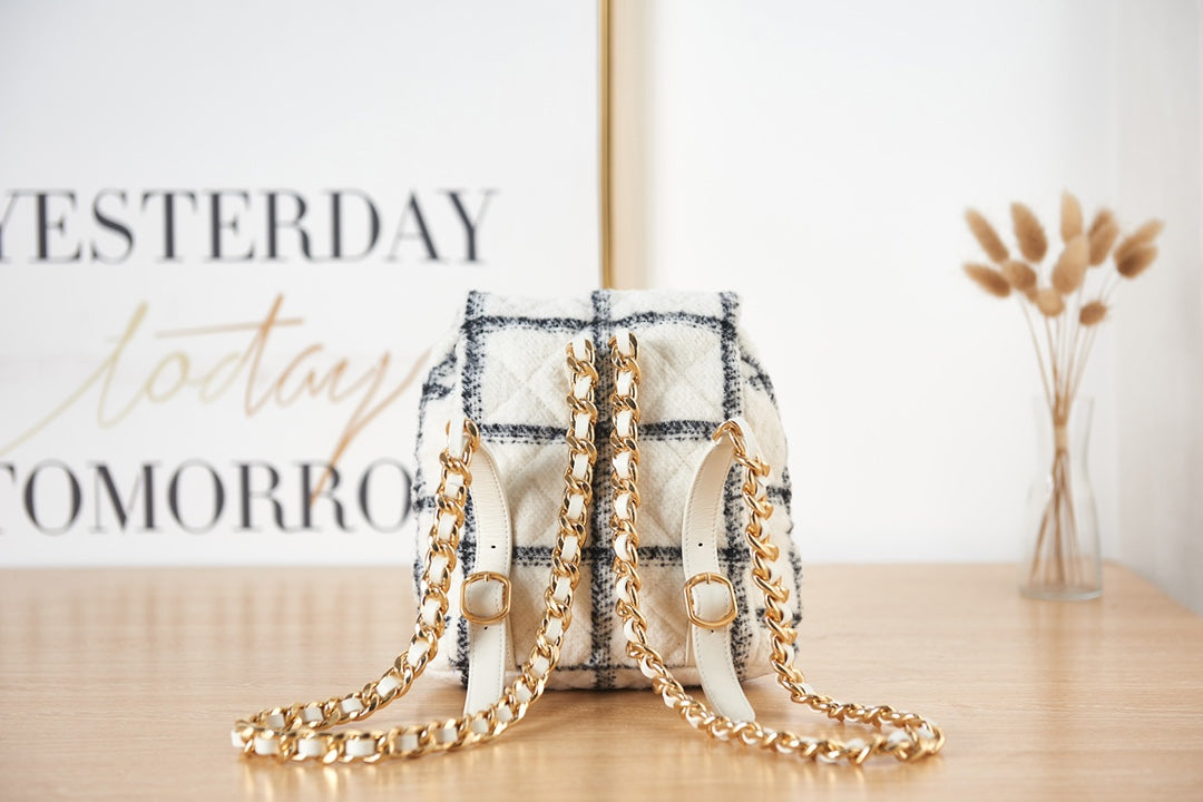 Elegant White and Black Quilted Tweed Mini Backpack with Gold Chain Straps