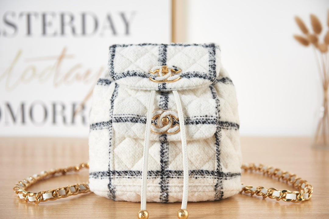 Elegant White and Black Quilted Tweed Mini Backpack with Gold Chain Straps