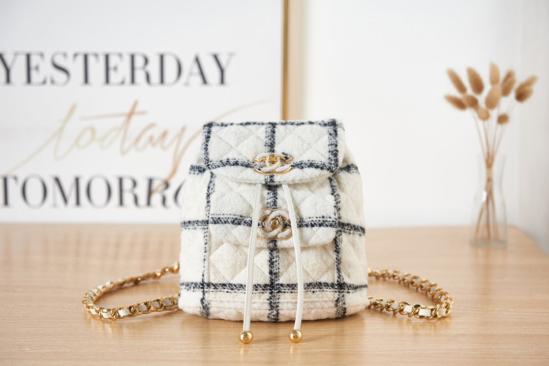 Elegant White and Black Quilted Tweed Mini Backpack with Gold Chain Straps