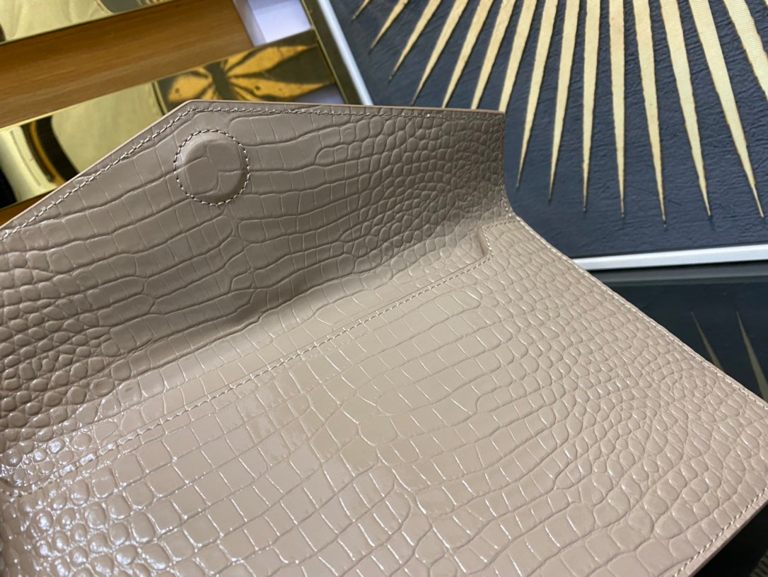 Saint Laurent Uptown Pouch in Shiny Crocodile-Embossed Leather - Beige