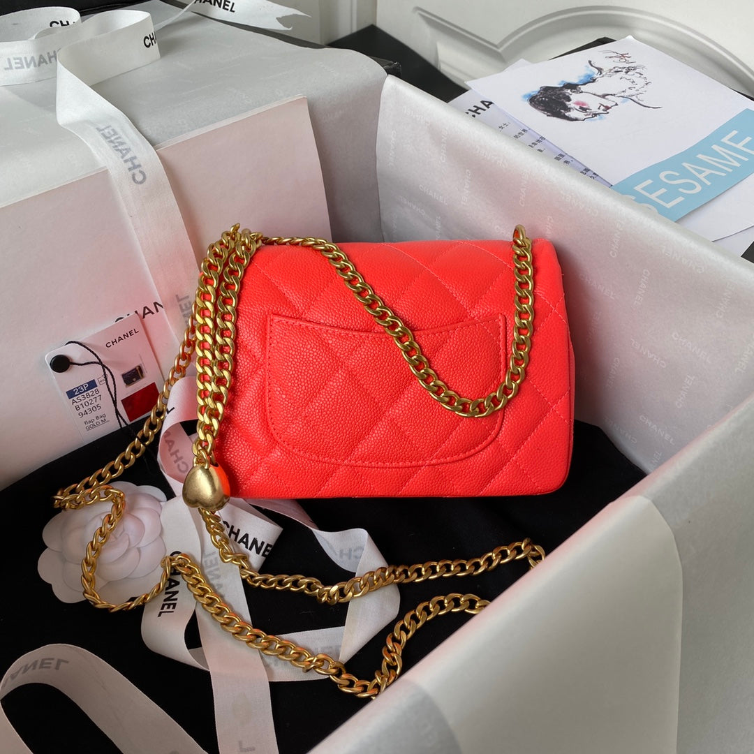 Chanel Lambskin Quilted Mini Flap Bag with Heart Slider Chain - Coral