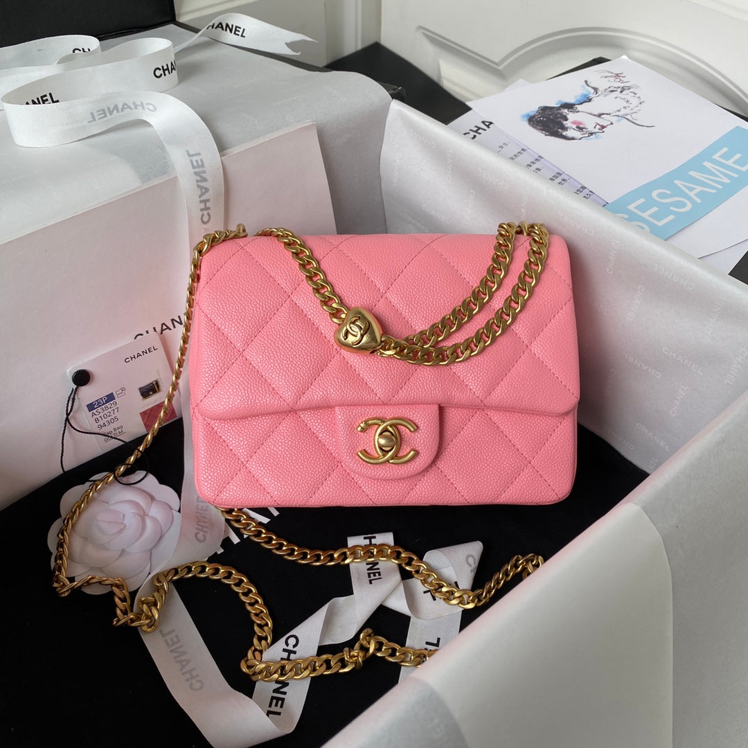 Chanel Pink Quilted Mini Flap Bag with Gold Hardware and Heart Charm