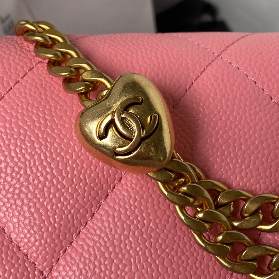 Chanel Pink Quilted Mini Flap Bag with Gold Hardware and Heart Charm